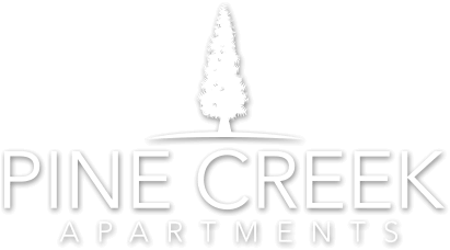Pine Creek Apartments logo